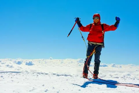 Hiker at the top of a pass Stock Photos