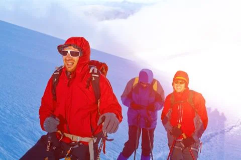 Hiker at the top of a pass Stock Photos