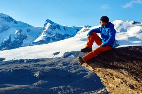 Hiker at the top of a pass Stock Photos