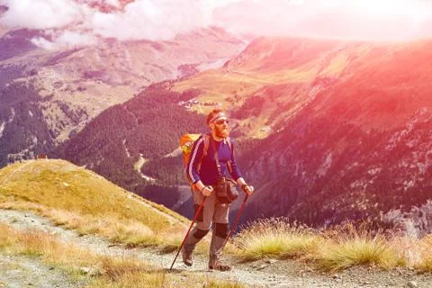 Hiker at the top of a pass Stock Photos
