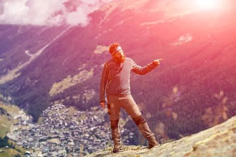 Hiker at the top of a pass Stock Photos