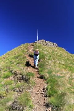 Hiker to the top Stock Photos