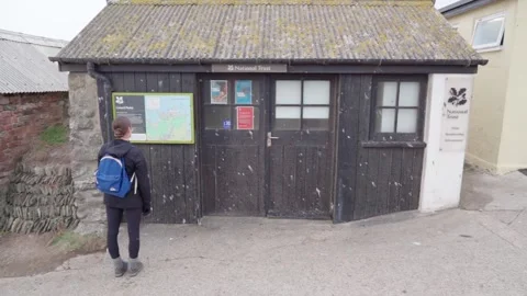 Hiker Tourist Reading Map In Cornwall Stock Footage 153312666