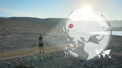 Hiker use digital tablet device to determine location, route of his excursion Stock Photos