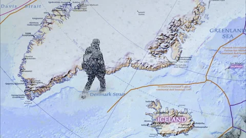 Hiker Walking Across Abstract Map Sea Passage Between Greenland and Iceland 스톡 동영상 337412802