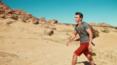 Hiker Walking in Desert Stock-Footage 48784586