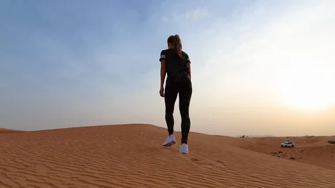 Hiker walking in the desert Stock Footage 123911865