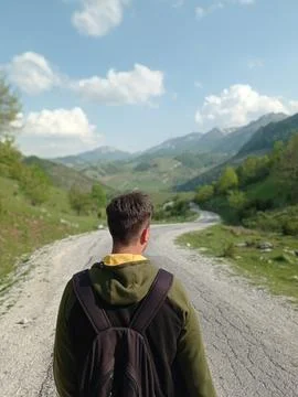 Hiker walking down path Stock Photos