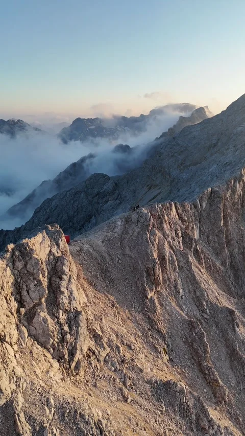 Hiker Walking on an Epic Mountain Ridge at Sunrise in Bavaria, Germany Vídeos de archivo 335969339