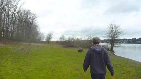 Hiker Walking on Grassy Path 1 Stock Footage 2594598