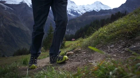 Hiker walking up the mountain Stock Footage 76005927