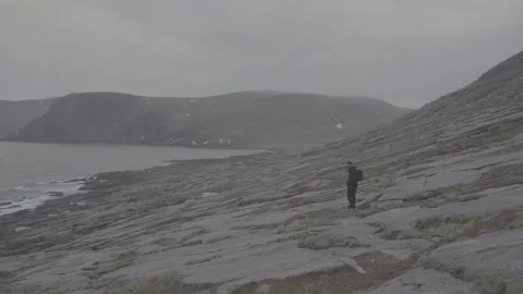 Hiker walking in Nordkapp Stock Footage 141475193