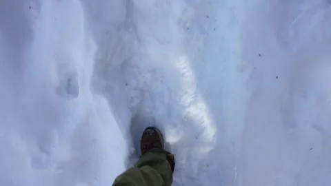 Hiker walking through deep fresh snow Stock-Footage 328912516