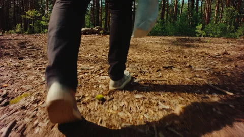 Hiker Walking Through Forest Trail Close Up Sneakers 4K Stock Footage 244976150