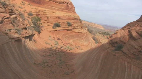 Hiker Walking Through the Vermilion Cliffs – South Coyote Buttes Stock Footage 298430