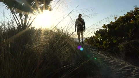 Hiker walks to the ocean Stock Footage 171949097