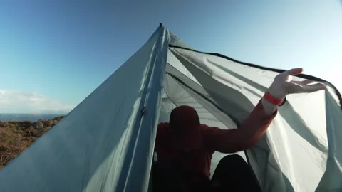 Hiker Waving From Inside His Tent on the Isle of Skye Stock-Footage 338321742
