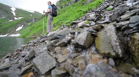 Hiker woman is walking mountain, Stock Footage 65203853