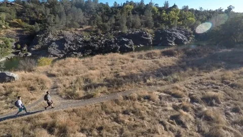 Hikers Along the River Stock Footage 87157882