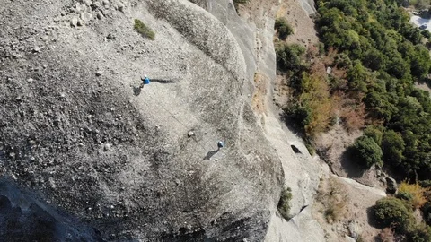 Hikers on big rock mountain Video stock 106947807