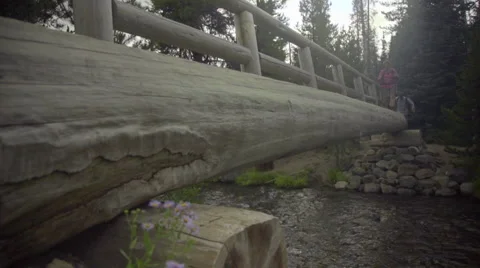 Hikers cross bridge Stock Footage 59131839