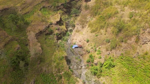 Hikers Cross Dry Riverbed As Clouds Roll Overhead Rinjani Mountain Lombok Stock Footage 337108400