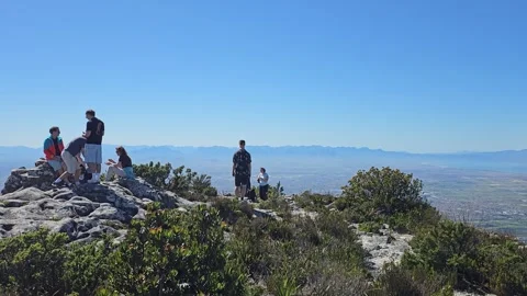Hikers at the Edge, Table Mountain, Cape Town, South Africa 8K Stock Footage 347933429