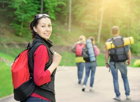 Hikers in forest. Stock Photos