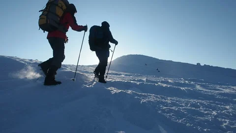 Hikers Hiking Alpinism. Extreme Cold Weather Trekking In Winter. Stock Footage