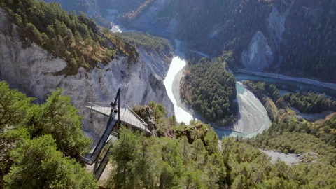 Hikers Looking from an Observation Deck Overlooking Ruinaulta in Switzerland Stock Footage 165533536