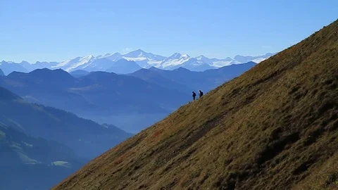 Hikers on Mountain looking down Stock-Footage 77730504