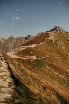 Hikers on Mountain Trail Stock Photos