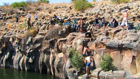 Hikers at pool 04 Stock Footage 89480974