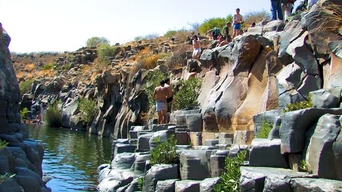 Hikers at pool 05 Stock Footage 89480976