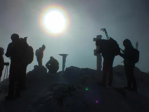 Hikers Reaching The Top Stock Photos