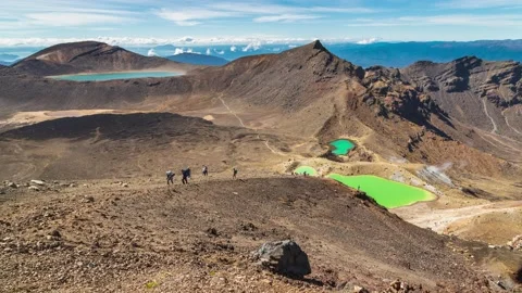 Hikers sliding down to the Emerald Lakes of Tongariro Crossing,4k,timelapse Stock Footage 229763511