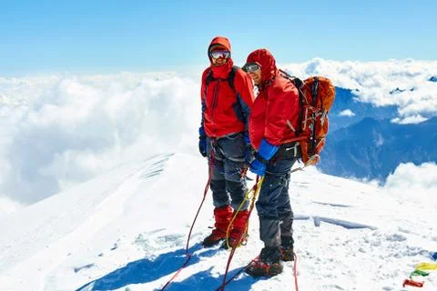 Hikers at the top of a pass Stock Photos