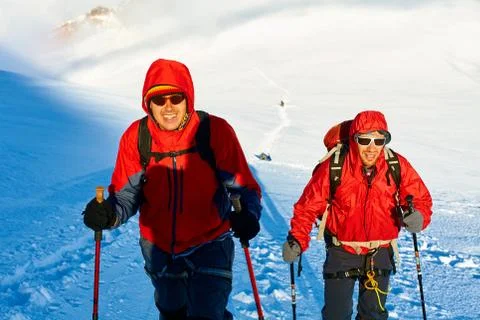 Hikers at the top of a pass Stock Photos