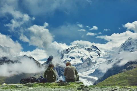Hikers on the trail in the mountains Stock Photos