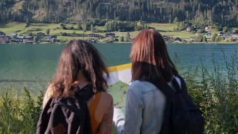 Hikers using paper map in austria Video stock 130494055