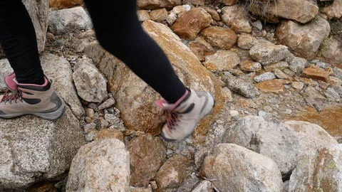 Hikers walk along the path to the Lac de Melo in Restonica Valley at winter Stock-Footage 107579110