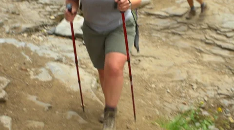 Hikers walk past the camera Stock Footage 58929780