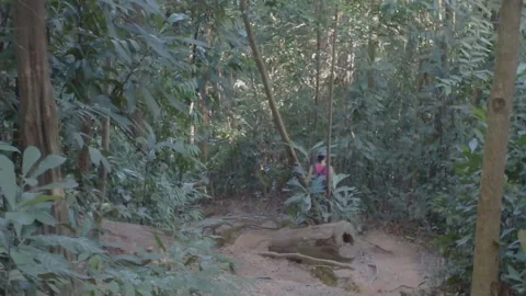 The hikers walked down the dirt road. Video stock 341800877