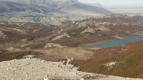 Hikers walking away from camera at Monte Fitz Roy Stock Footage 89682253