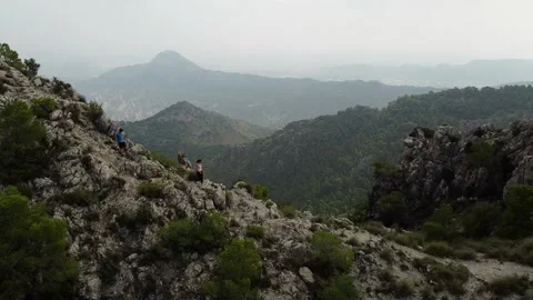 Hikers walking in group at mountain forests and pathways. Stock Footage 171477381