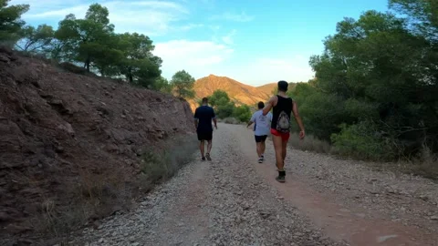 Hikers walking in group at mountain forests and pathways. Stock Footage 171477994
