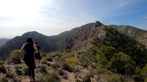 Hikers walking in group at mountain forests and pathways. 스톡 동영상 171478986