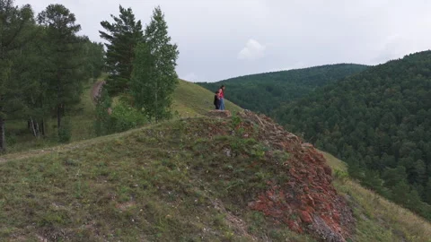 Hikers walking on mountain ridge exploring nature Video stock 316002466