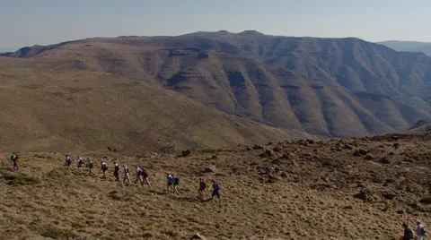 Hikers walking in the mountains Stock Footage 12267197