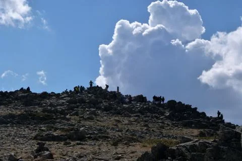 Hikers walking to summit Stock Photos